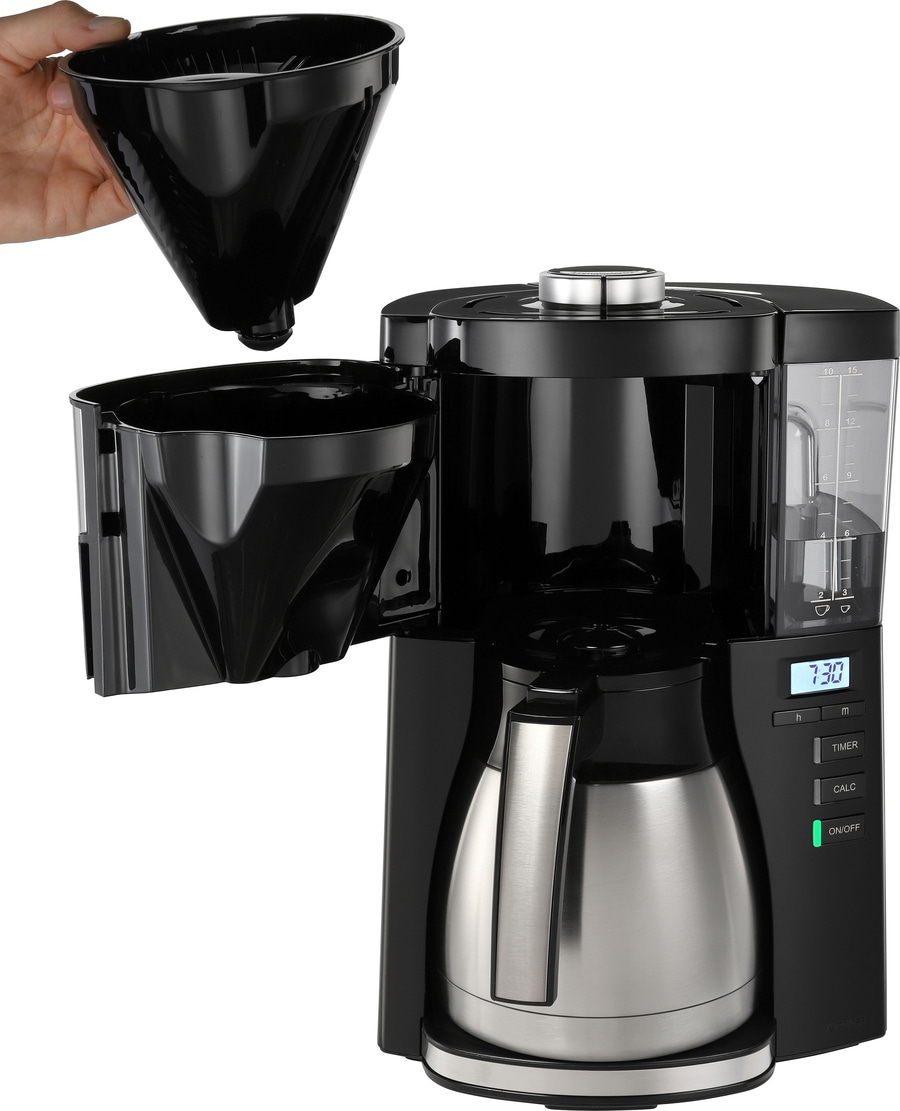 Kaffeemaschine mit herausnehmbarem Filter, digitaler Anzeige und Edelstahlkanne.