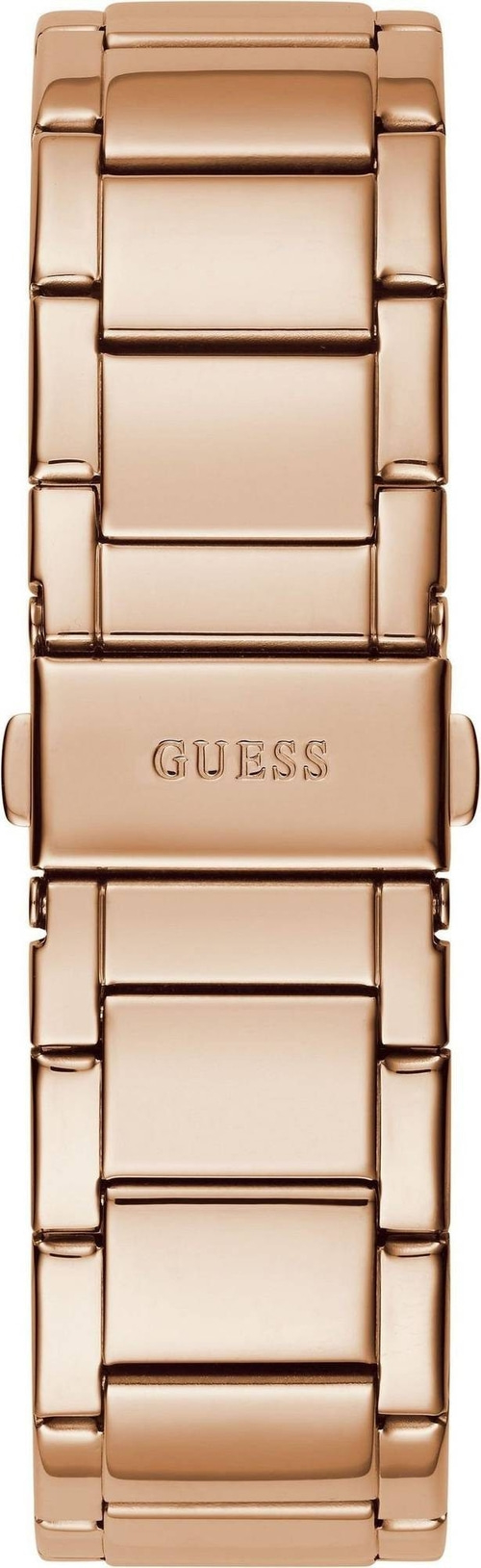 Nahaufnahme einer roségoldenen Guess-Uhr mit Gliederkette und Guess-Logo