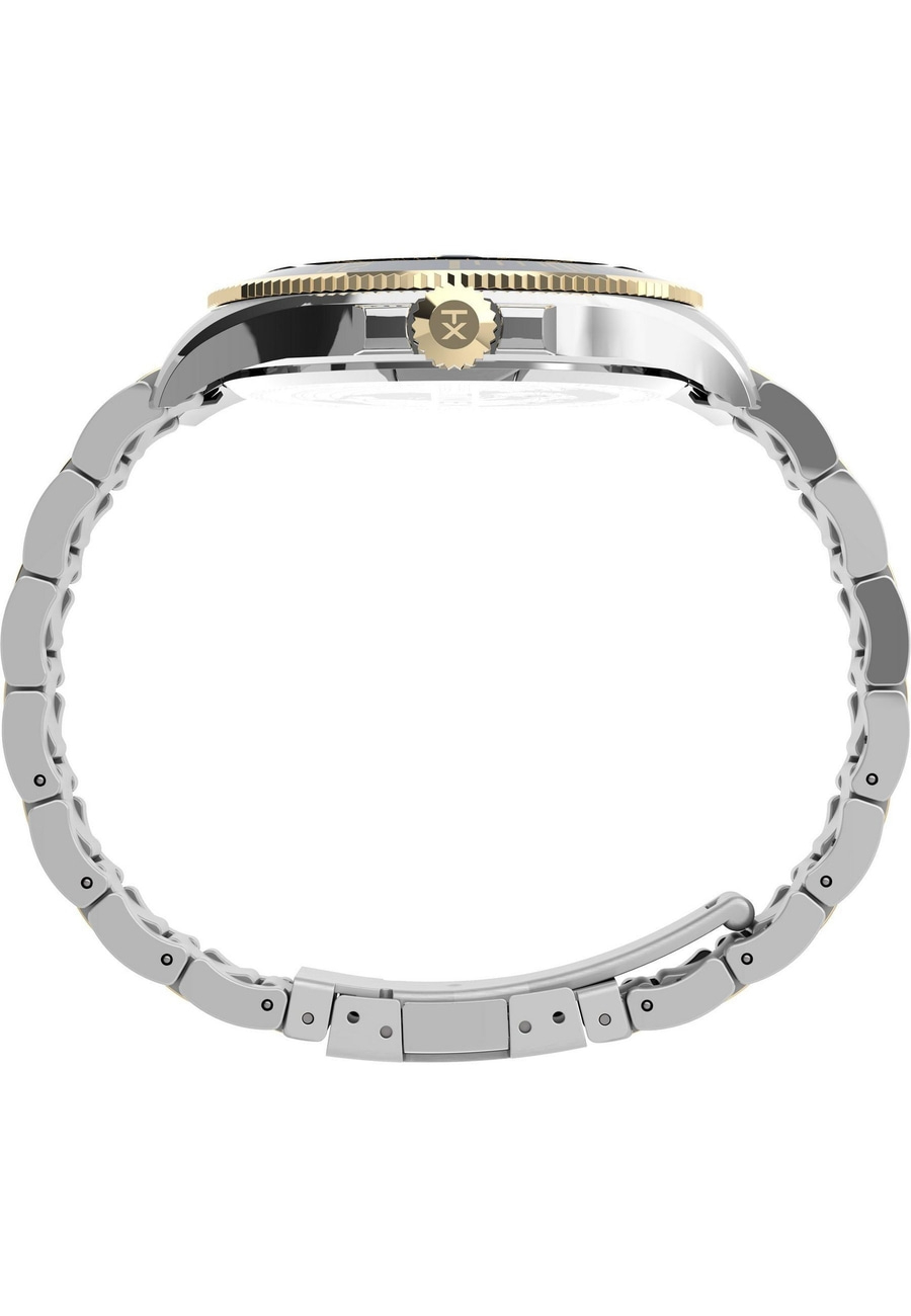 Seitenansicht einer eleganten silbernen Uhr mit goldenem Zifferblatt und Band