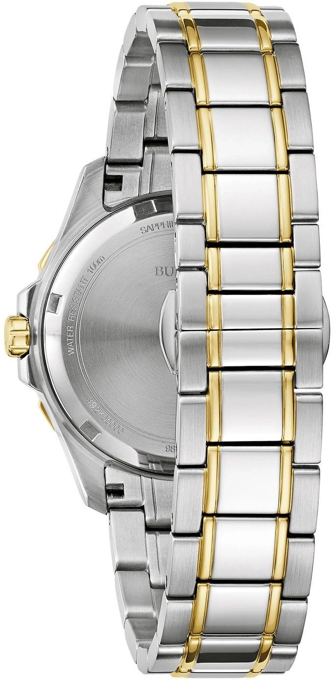 Uhr mit silbernem und goldenem Armband, Detailaufnahme, Nahaufnahme, Schmuck