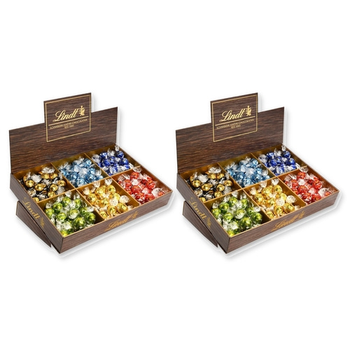 Zwei Lindt Schokoladenboxen mit bunten Pralinen gefüllt