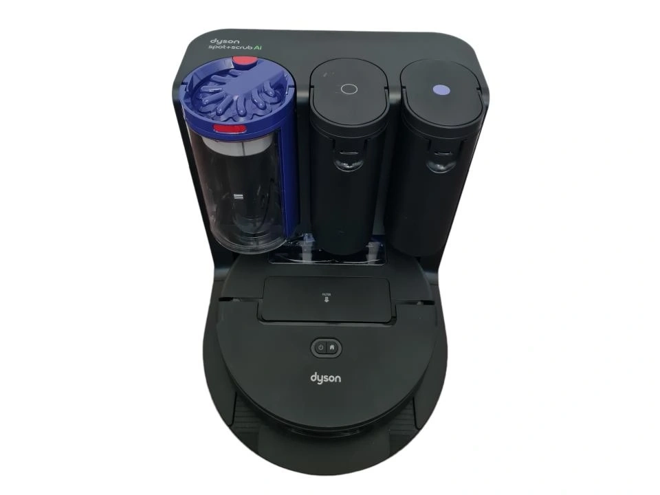 Ein Dyson Saugroboter mit zwei Behältern und einer Bürste.