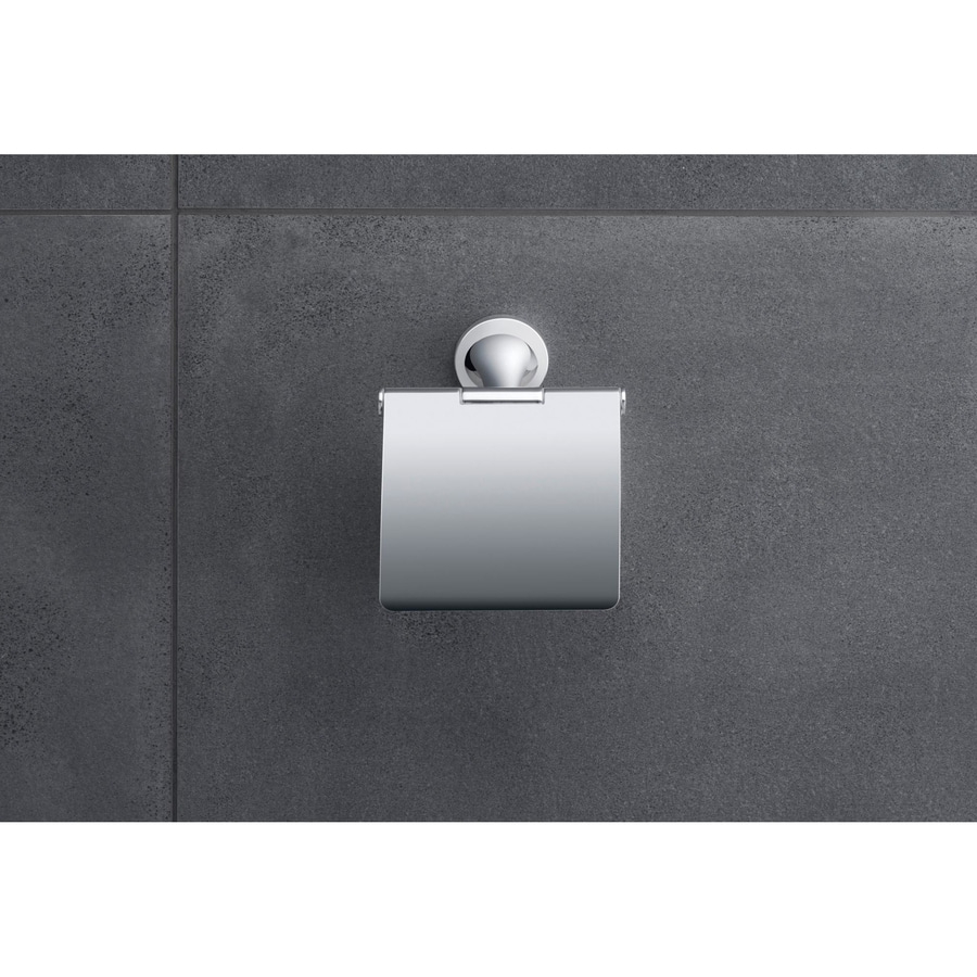Toilettenpapierhalter aus Metall an grauer Wand, Badezimmer-Accessoire