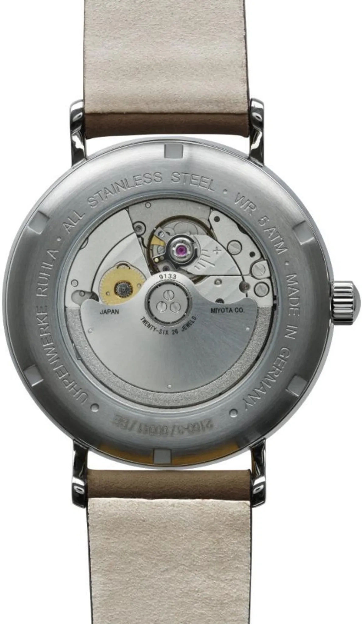 Rückseite einer mechanischen Uhr mit sichtbarem Uhrwerk und Lederarmband