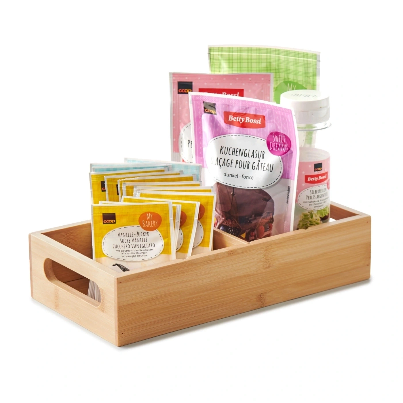 Holzbox mit Backzutaten: Zucker, Vanille, Kuchenglasur, Silberperlen.