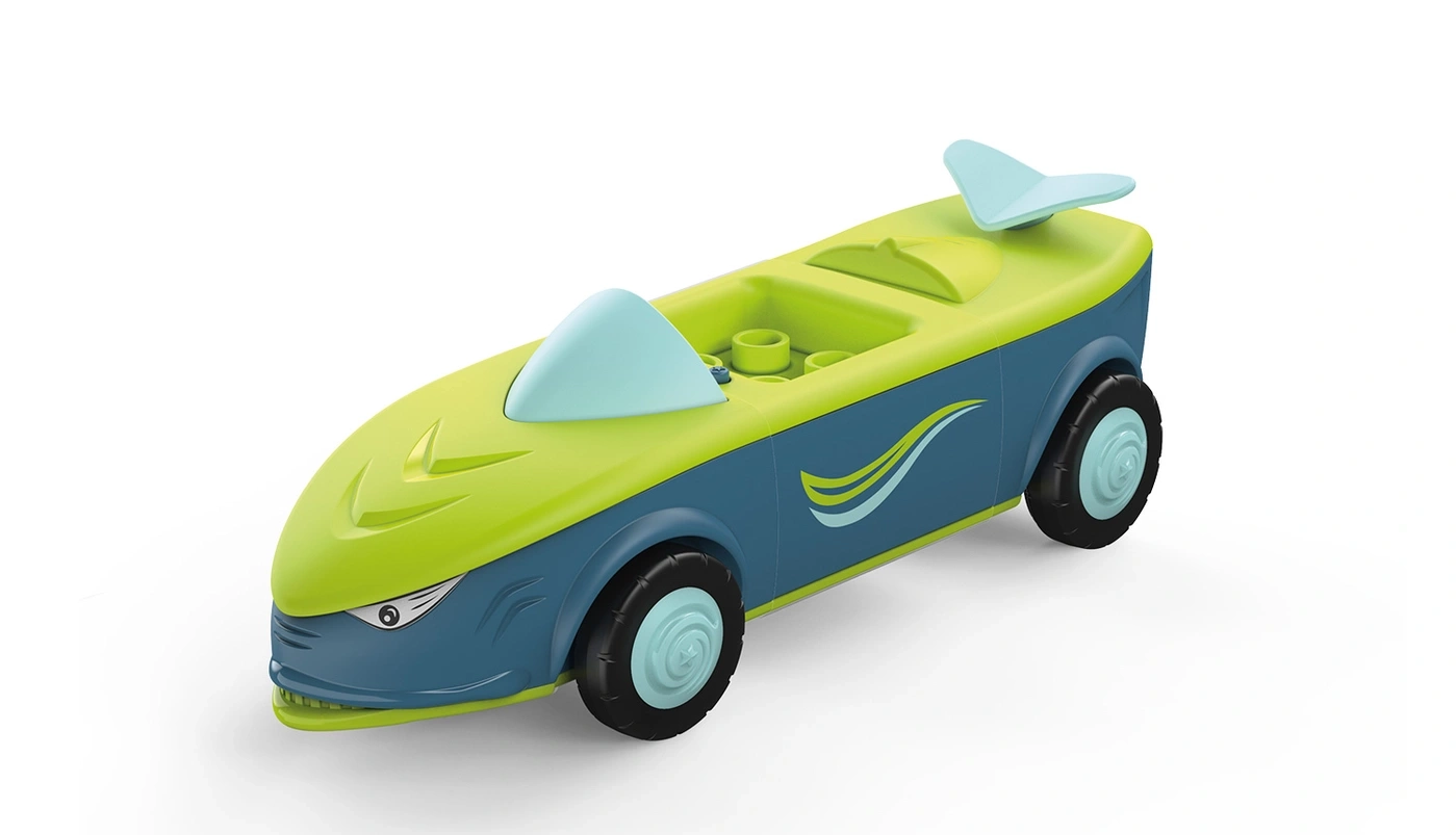 Ein Spielzeugauto mit Hai-Design, grün und blau, mit Flügeln.