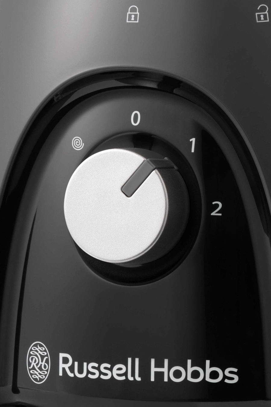 Drehknopf mit Zahlen 0, 1, 2 und Russell Hobbs Logo. Schwarzer Hintergrund.