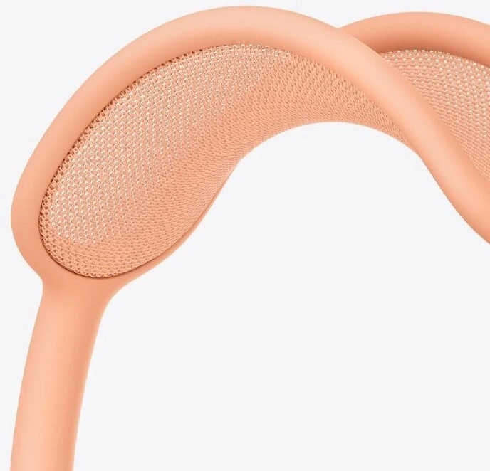 Nahaufnahme eines rosafarbenen Kopfhörers mit Mesh-Gewebe und weichem Design