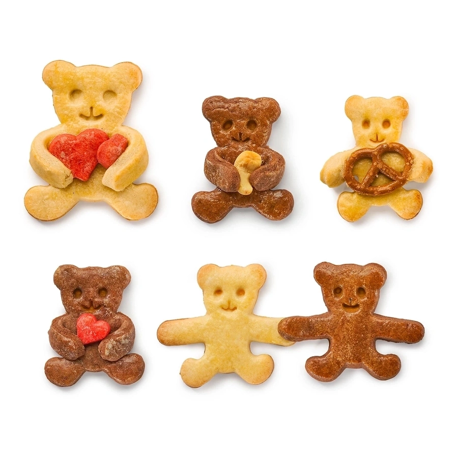 Sechs Teddybären-Kekse in verschiedenen Farben und mit verschiedenen Accessoires.