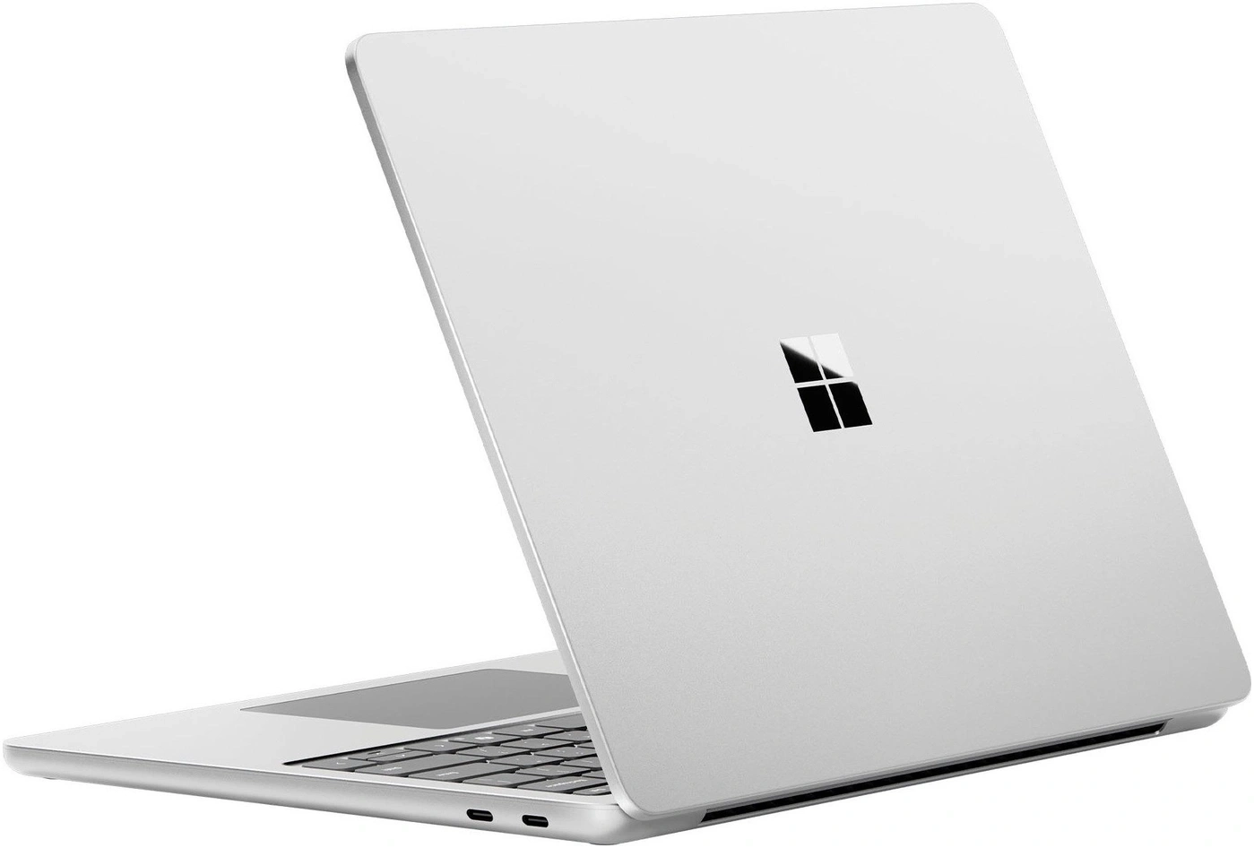 Ein silberner Laptop mit dem Windows-Logo auf dem Deckel.