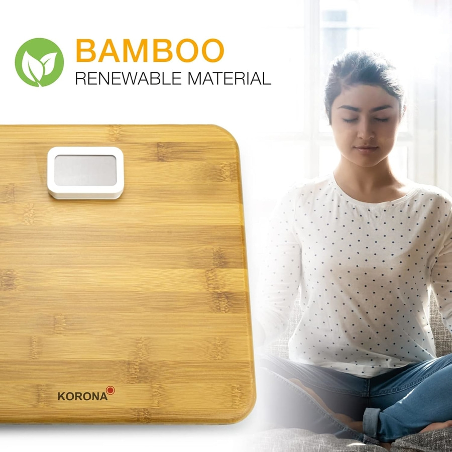 Bambus-Waage mit Frau, die meditiert, und Text 'BAMBOO RENEWABLE MATERIAL'