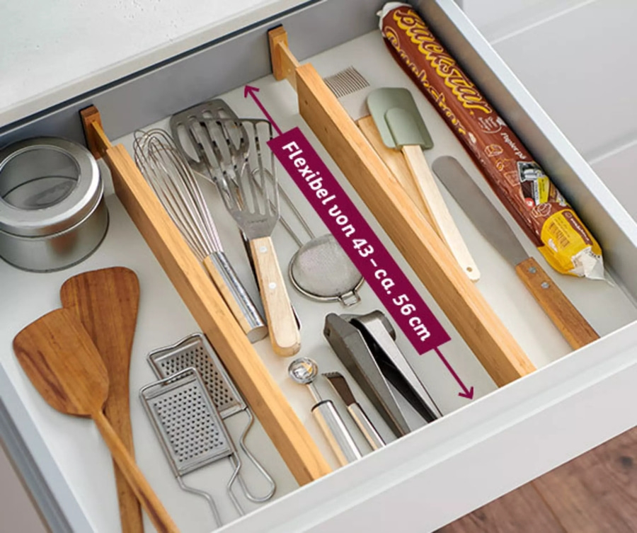 Küchenschublade mit Küchenutensilien und flexiblen Trennwänden für Ordnung