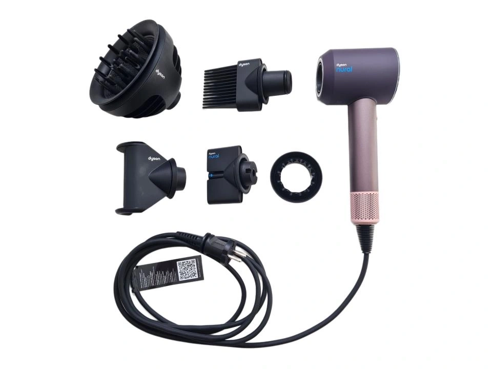 Dyson Haartrockner mit verschiedenen Aufsätzen und einem Kabel