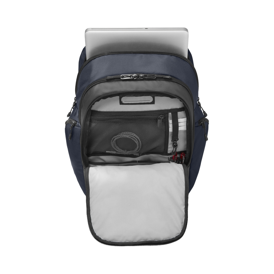 Blauer Rucksack mit Laptop und geöffneter Tasche, Innenansicht mit Zubehör.