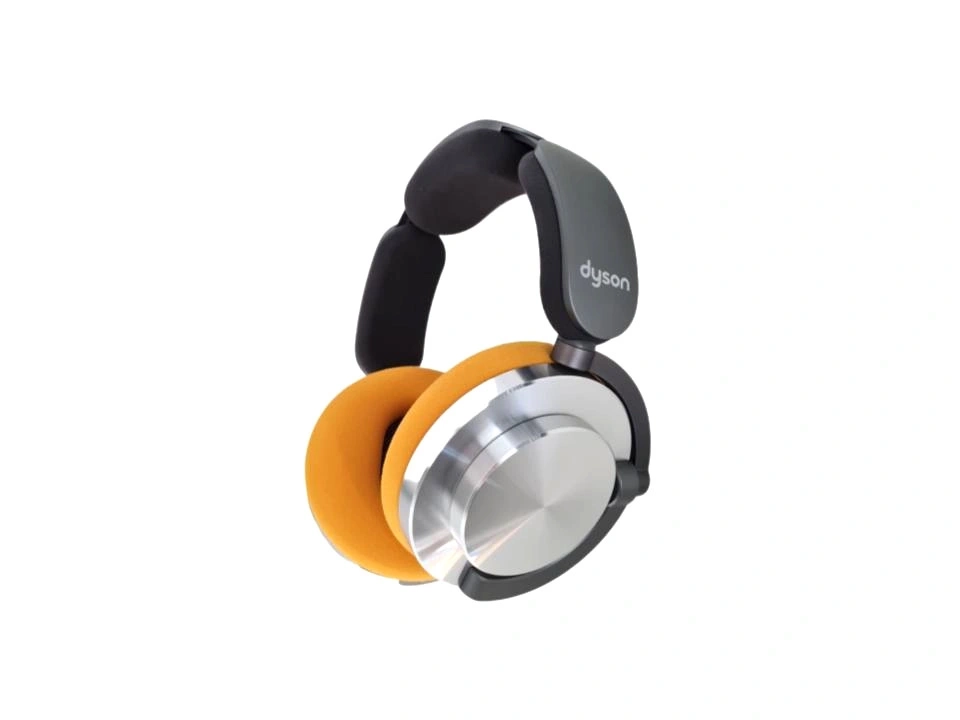 Dyson Kopfhörer mit orangefarbenen Ohrpolstern und silbernen Akzenten.