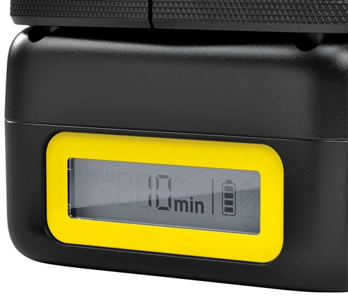 Nahaufnahme eines schwarzen Geräts mit gelbem Rahmen und Display, das 10 min anzeigt.