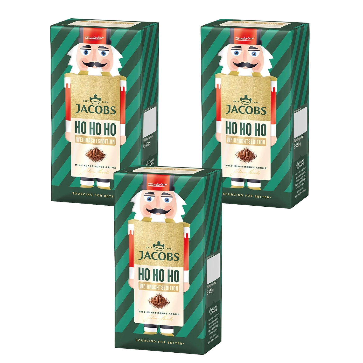 Drei Jacobs "Ho Ho Ho" Weihnachtsedition Kaffeepackungen mit Nussknacker-Design.