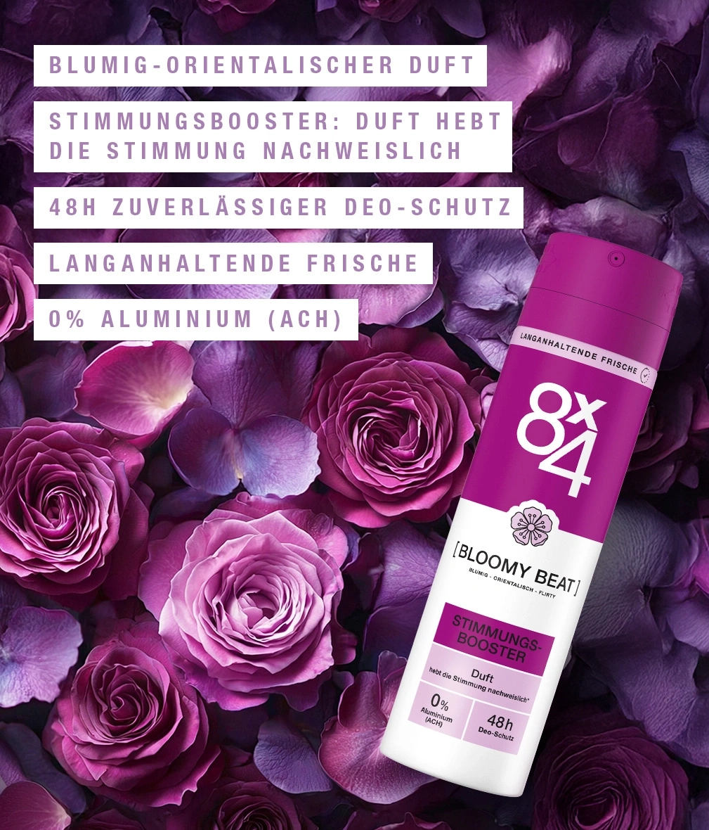 Ein violetter Aerosolbehälter mit Rosen und Hydrangea-Blüten.