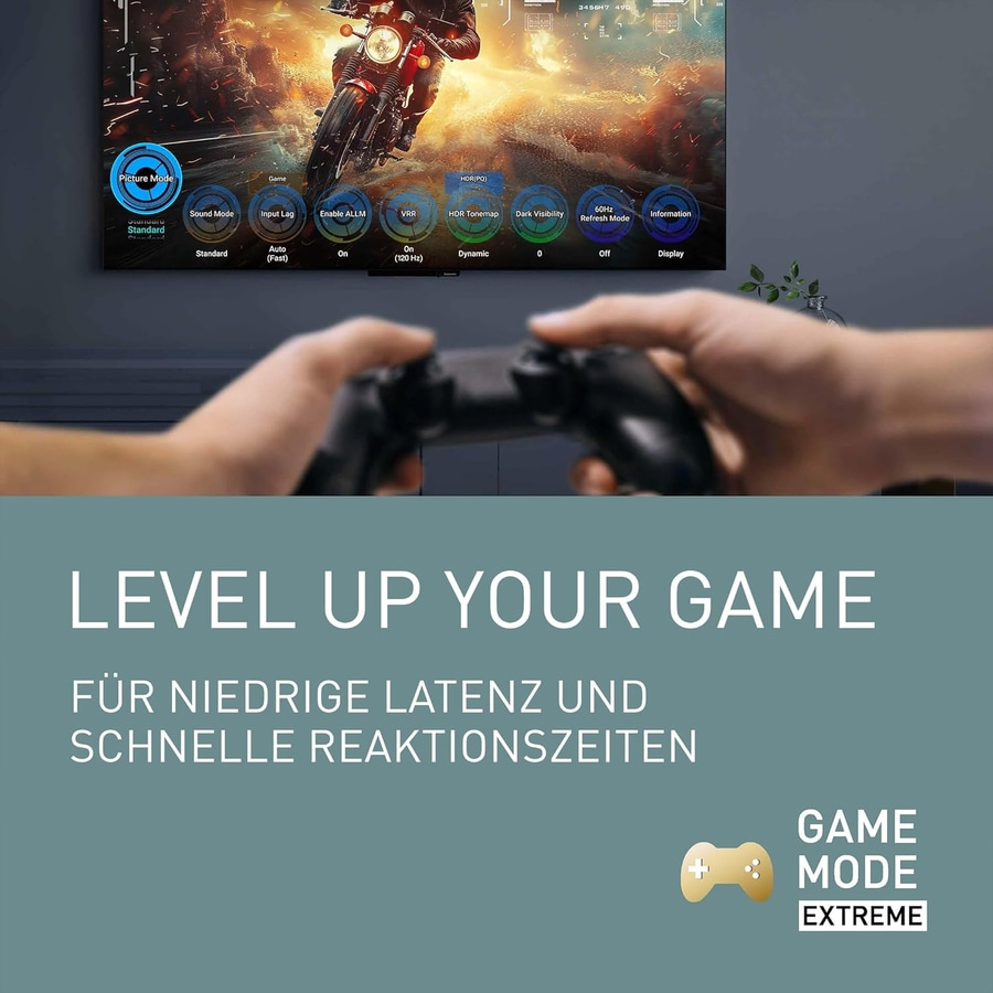 Fernseher im Spielmodus mit Controller und Text: Level Up Your Game.