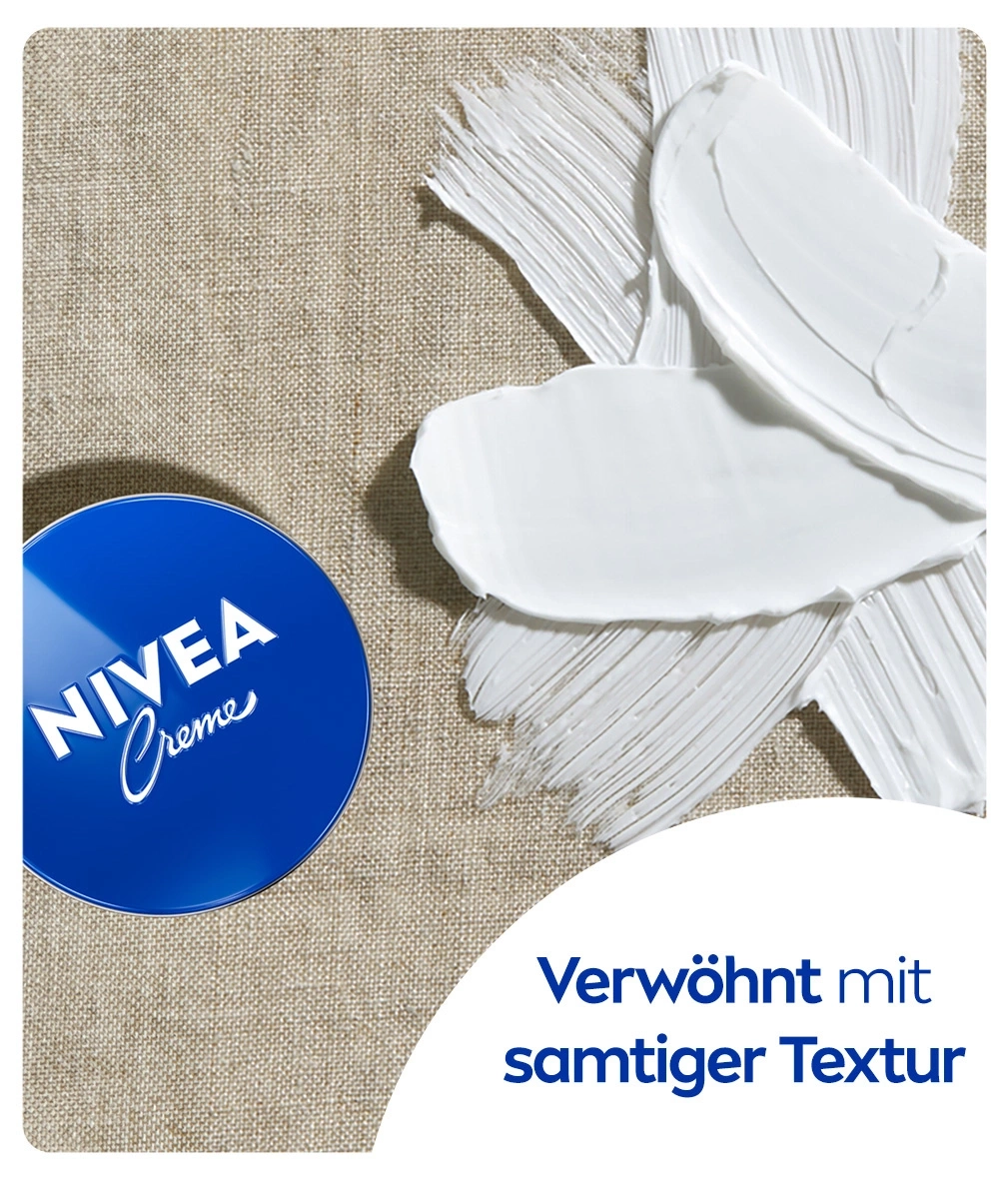 Nivea Creme, weiße Creme, Textur, blaues Gefäß, Stoffhintergrund, samtig