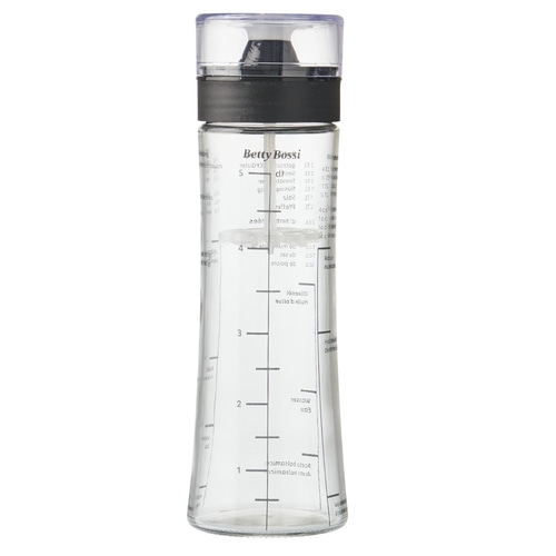 Eine Messflasche mit dem Logo Betty Bossi und Messskalen in ml und englischen Maßeinheiten.