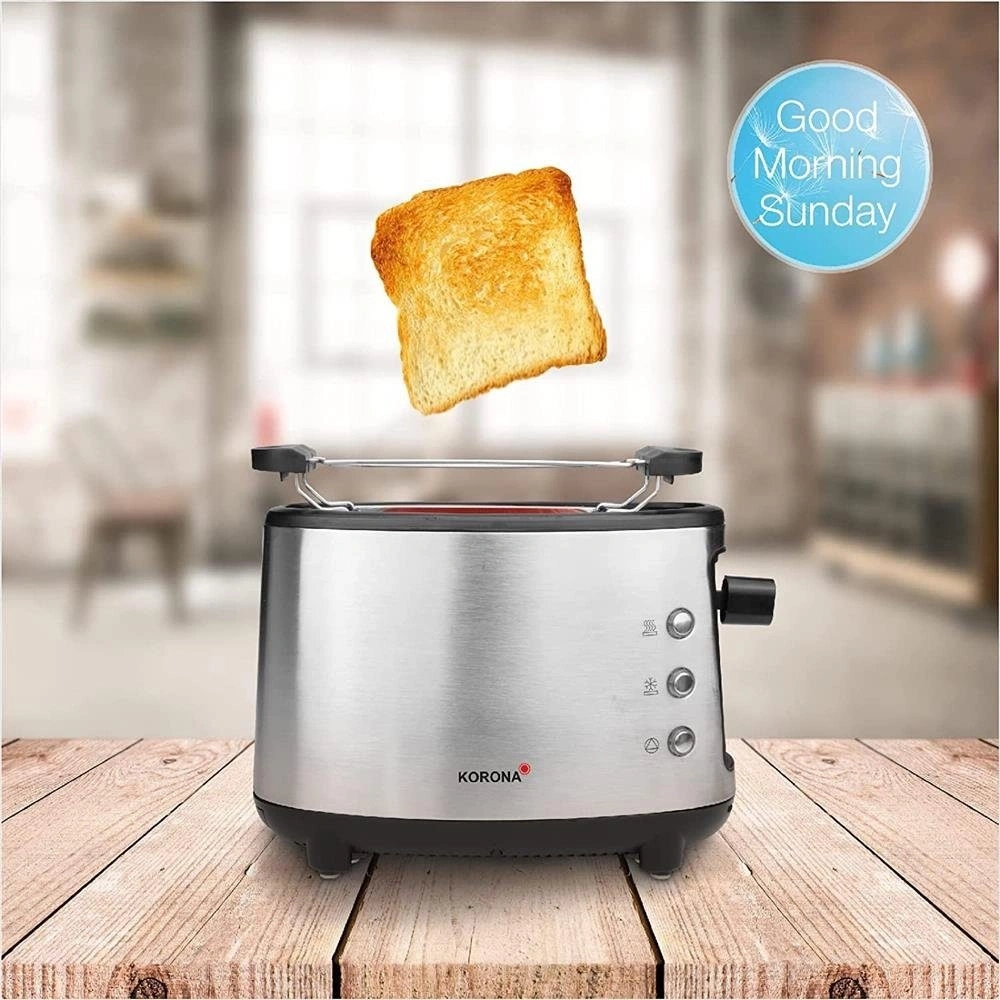 Ein Toaster mit einem Toastbrot, das aus dem Toaster springt, auf einem Holztisch.