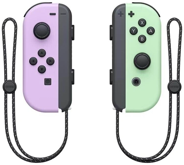 zwei Nintendo Switch Joy-Con-Controller, einer lila und einer mintgrün, mit Lanyards