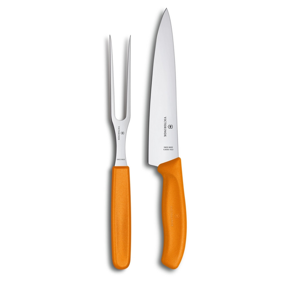 Ein Fleischgabel und ein Messer mit orangefarbenen Griffen von Victorinox.