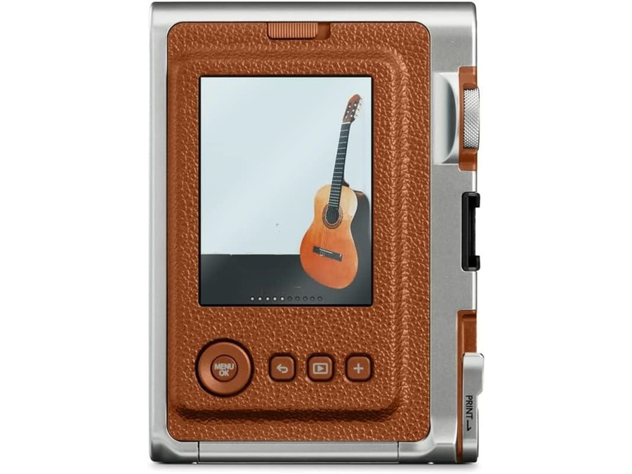Rückseite einer braunen Sofortbildkamera mit Gitarrenbildschirm und Bedienelementen