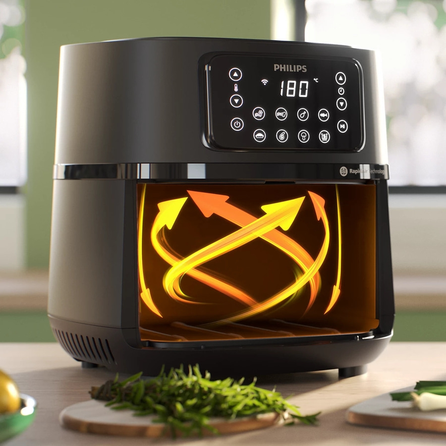 Schwarze Philips Heißluftfritteuse mit Pfeilen und Temperaturanzeige von 180 Grad Celsius.