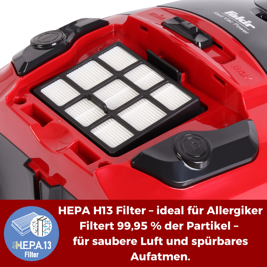 Ein roter Staubsauger mit einem HEPA H13 Filter, der 99,95 % der Partikel filtert und für saubere Luft sorgt.