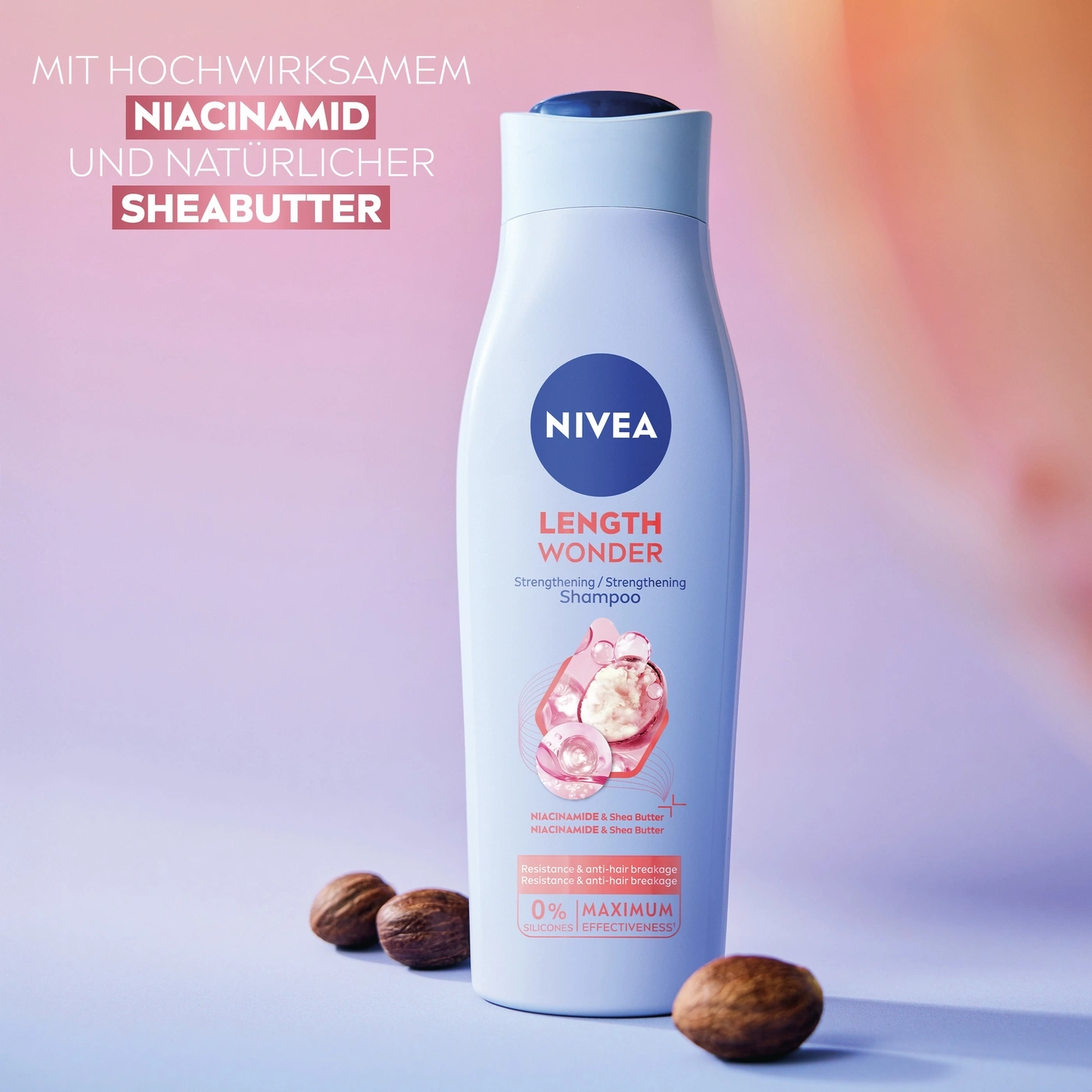 Eine Nivea Haarpflegeflasche mit Niacinamid und Sheabutter.