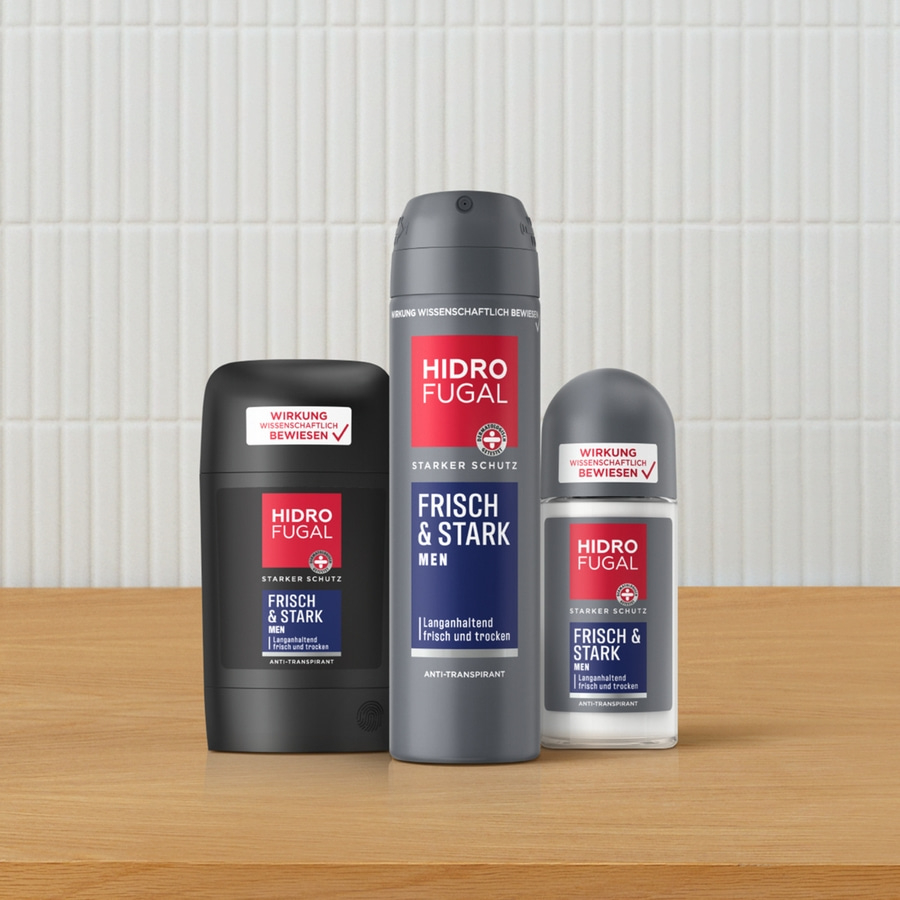 Drei Hidro Fugal Deodorants auf einem Holzbrett. Frisch und Stark für Männer.