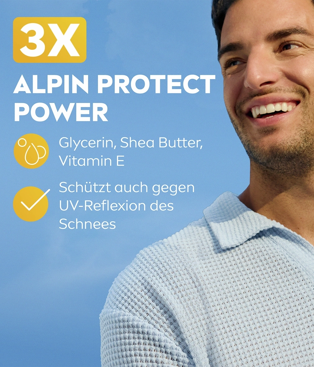 Ein Mann mit einem blauen Hemd und einem Lächeln
