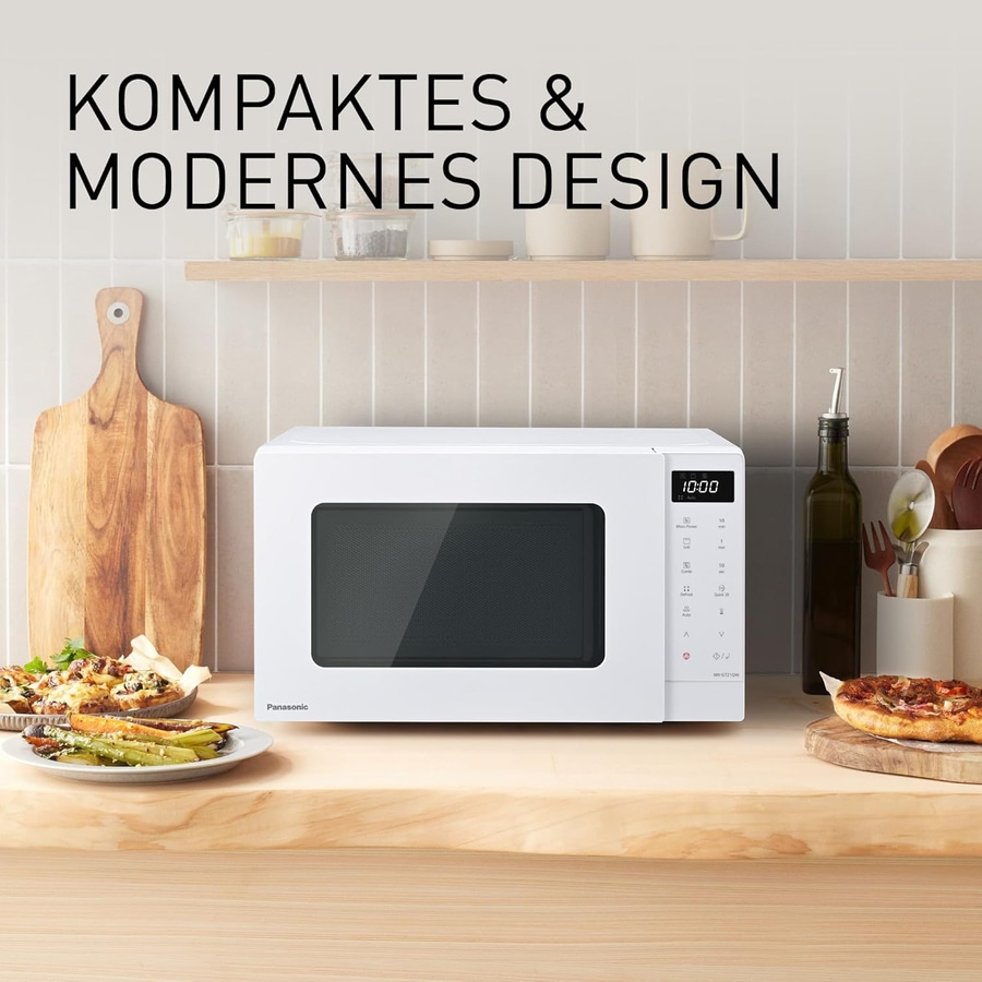 Weißer Panasonic-Mikrowellenherd mit modernem Design und Essen auf dem Tisch.