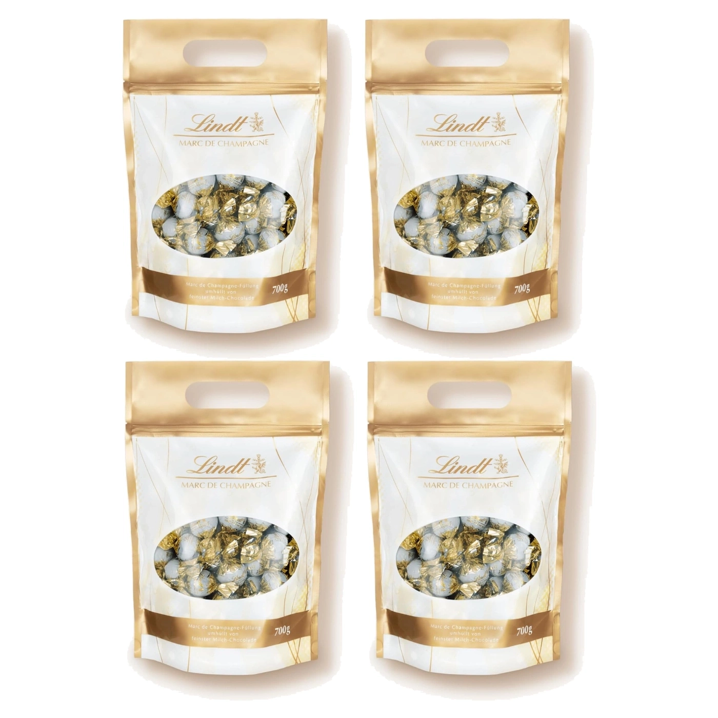 Vier Packungen Lindt Marc de Champagne Pralinen, 700g