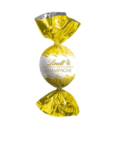 Lindt Champagne Praline in goldener Folie verpackt.
