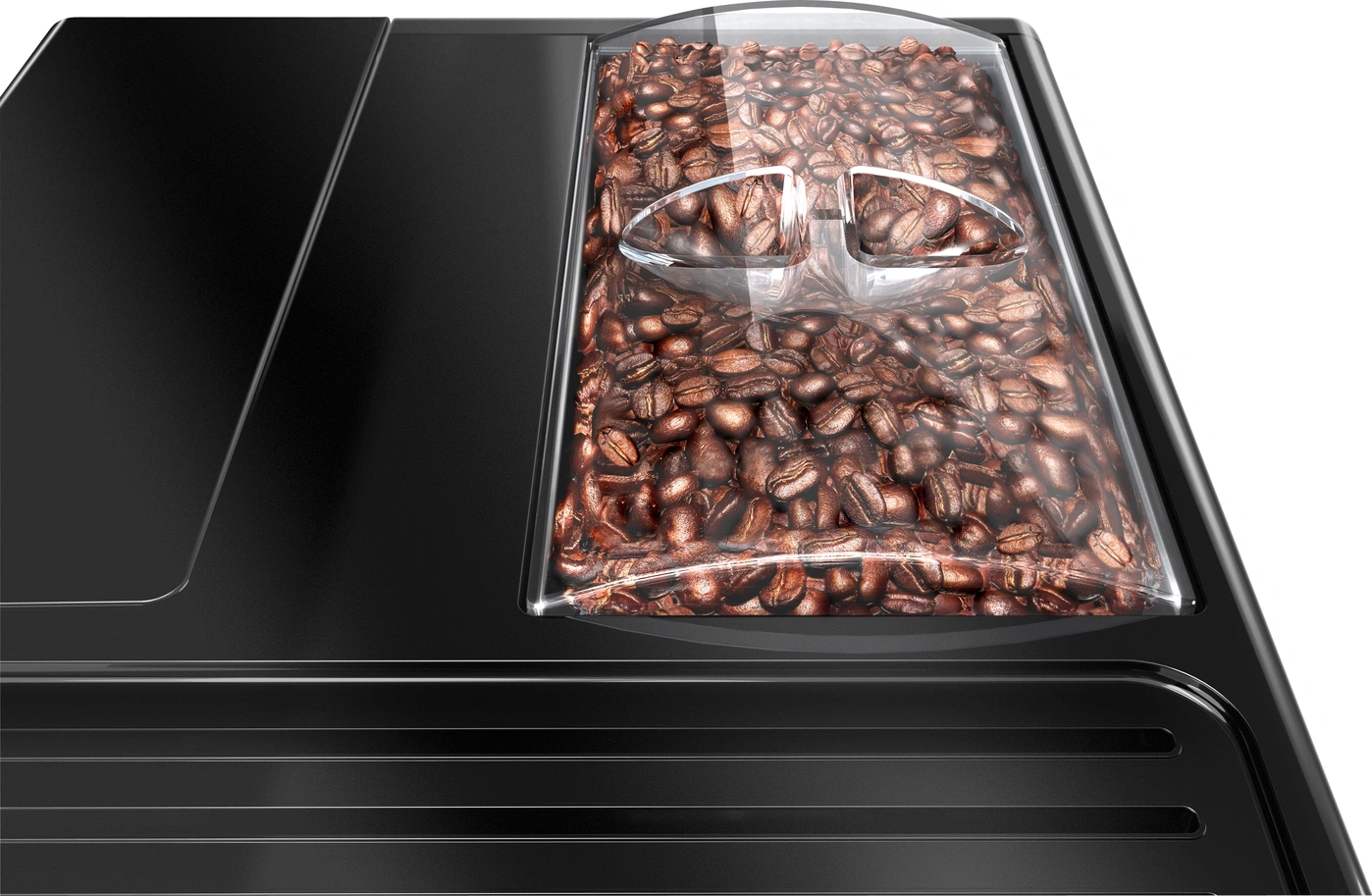 Kaffeebohnenbehälter, gefüllt mit Kaffeebohnen, auf einer schwarzen Oberfläche, Nahaufnahme