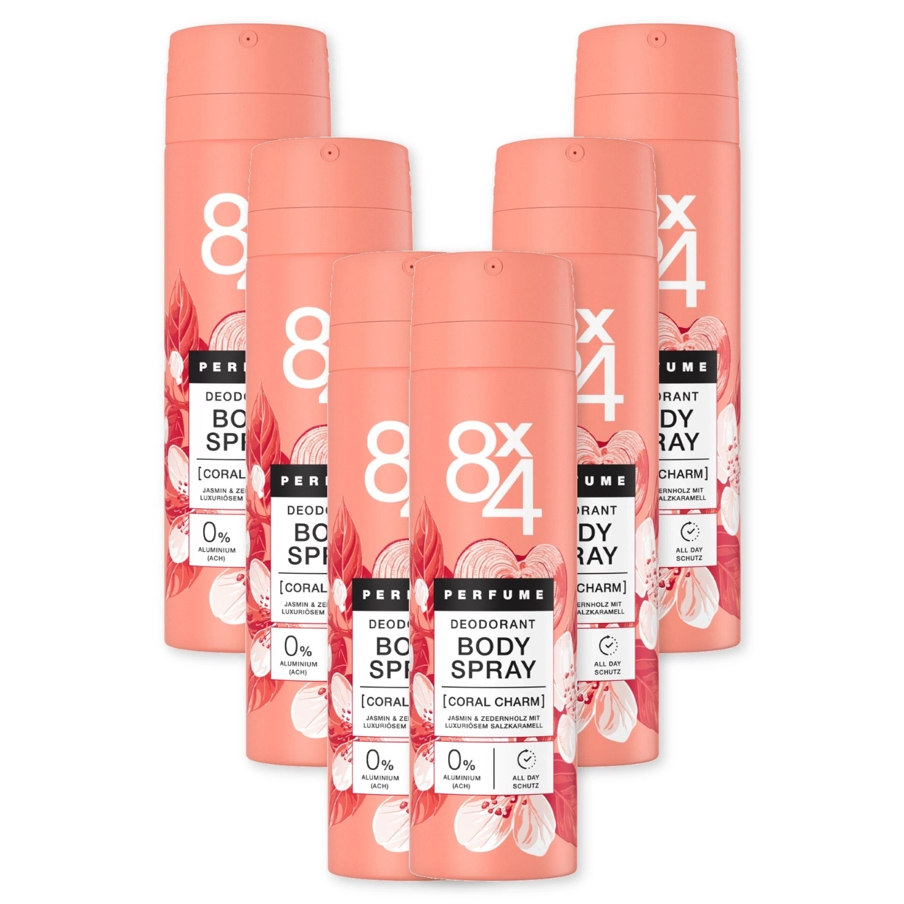 Fünf 8x4 Coral Charm Deodorant Bodyspray Dosen auf weißem Hintergrund.