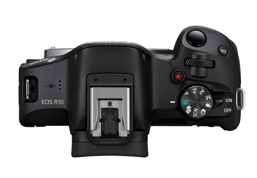 Draufsicht auf eine schwarze Kamera mit verschiedenen Knöpfen und Einstellungen.