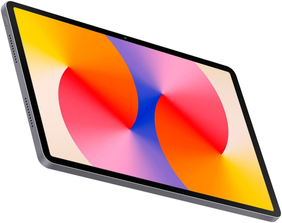 Graues Tablet mit farbenfrohem Bildschirm, der in der Luft schwebt, Nahaufnahme
