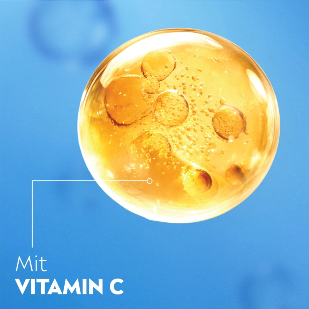 Große Blase mit Vitamin C auf blauem Hintergrund