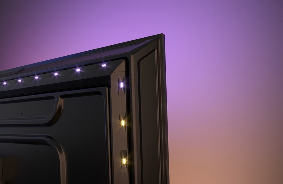 Schwarzes Gerät mit Lichtern, lila Hintergrund, Detailaufnahme, modern, Technologie