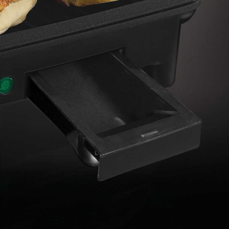 Schwarzer Grill mit herausnehmbarer Schublade und grünem Licht