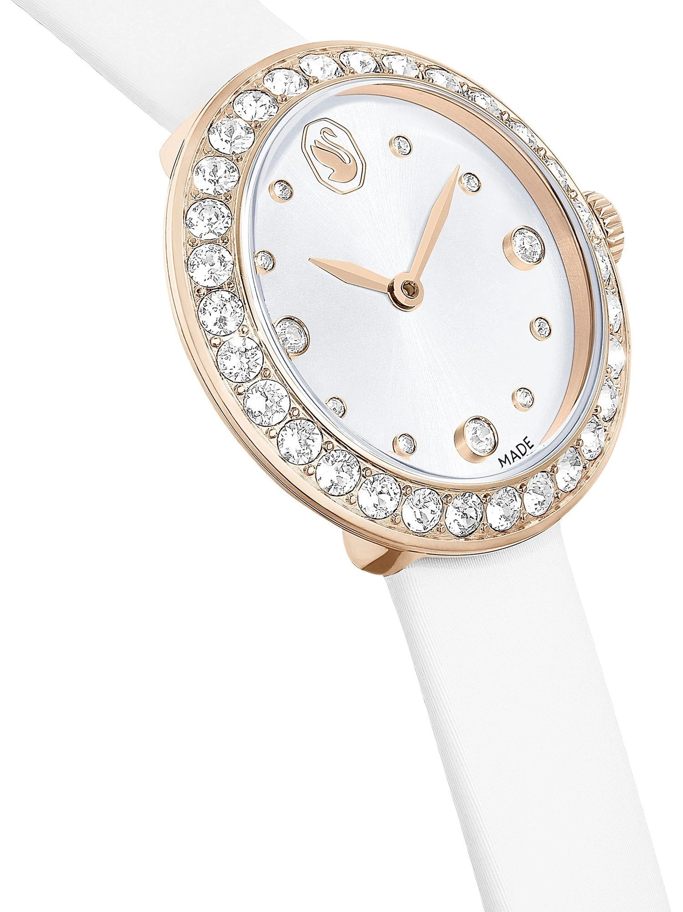 Eine weiße Swarovski Damenuhr mit rosévergoldetem Gehäuse und Kristallbesatz