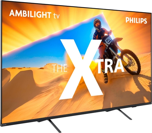 Philips Fernseher mit Ambilight-Technologie und Motorradfahrer-Motiv auf dem Bildschirm.
