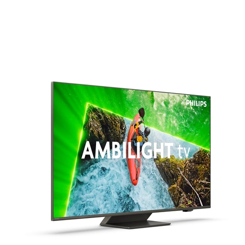 Philips Ambilight TV mit Kajakfahrer auf dem Bildschirm und grünem Licht