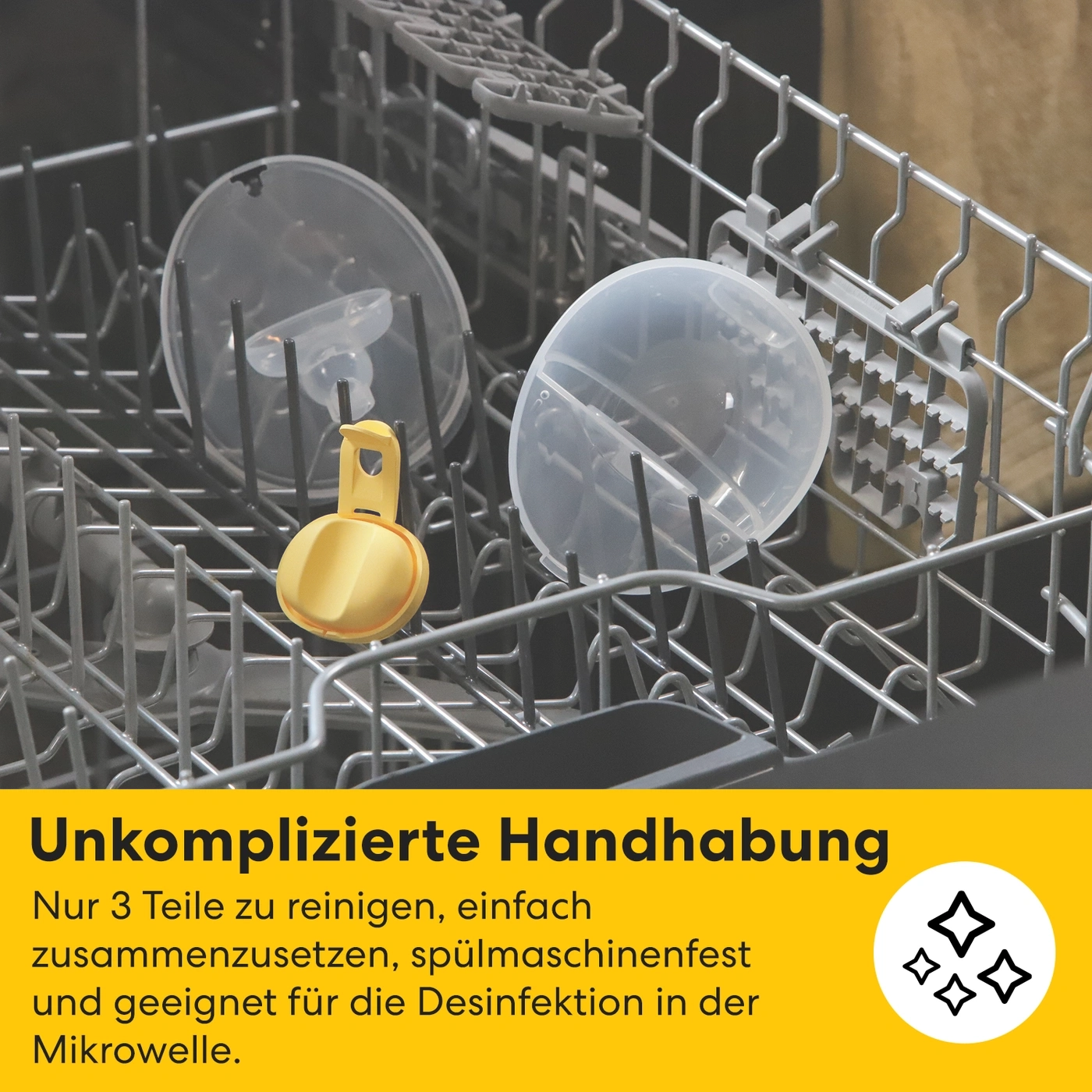 Geschirrkorb mit Babyflaschenteilen und gelbem Griff
