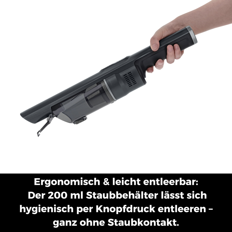 Hand hält schwarzen Handstaubsauger mit Text: Ergonomisch & leicht entleerbar: Der 200 ml Staubbehälter lässt sich hygienisch per Knopfdruck entleeren - ganz ohne Staubkontakt.