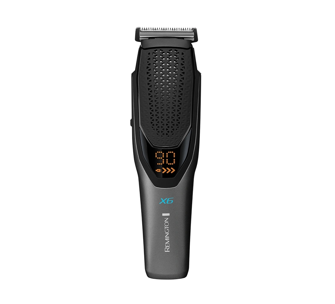 Ein digitaler Trimmer mit "90" und "X6" Anzeige. Das Gerät ist grau.